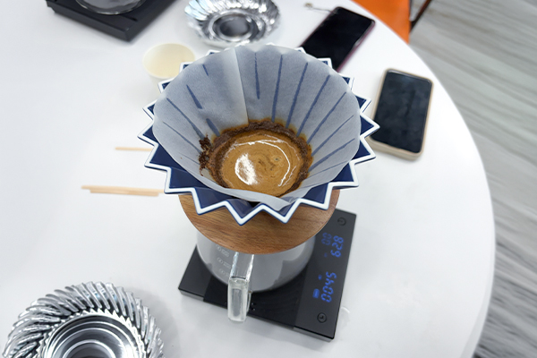 Students learning coffee tasting workshop SP Jain Global