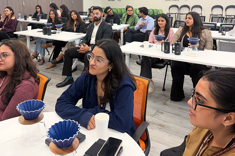 SP Jain Global Luxury Management workshop on hospitality and business leadership featuring Bili Hu, coffee founder, and Bharat Singhal