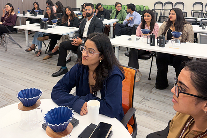 SP Jain Global Luxury Management workshop on hospitality and business leadership featuring Bili Hu, coffee founder, and Bharat Singhal